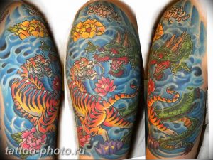 фото тату тигр и дракон 07.12.2018 №028 - tattoo tiger and dragon - tattoo-photo.ru